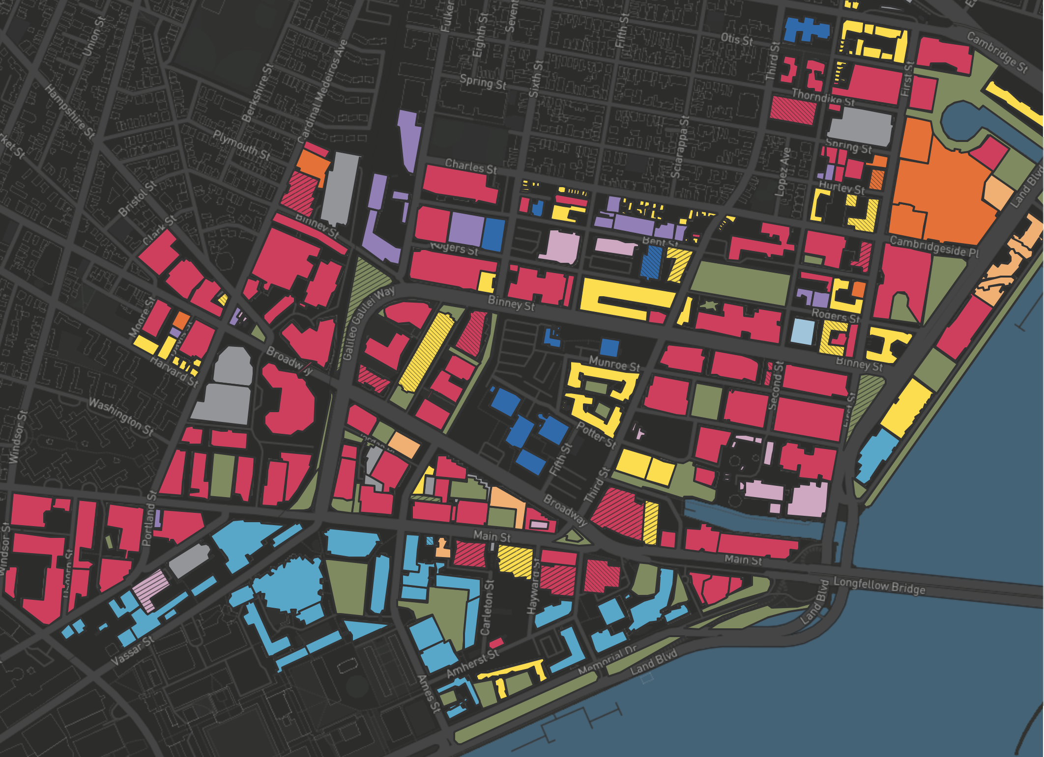 A 2018 map of MIT’s Kendall Square depicting the concentration of commercial R&D/office buildings (pink) surrounding MIT university buildings (blue).